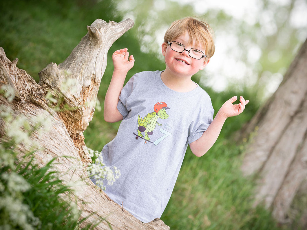 Celebrate in style with this super cool 7th birthday dinosaur shirt.