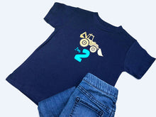 Load image into Gallery viewer, Flat lay of a navy digger t-shirt with jeans