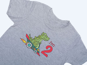 T-shirt with a T-Rex dinosaur in a racing car