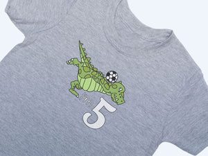 Free styling footballer T-rex dinosaur shirt