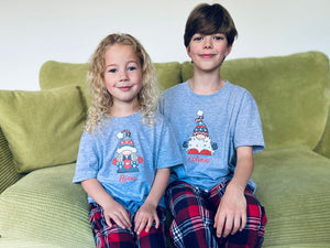 Tartan matching kids Christmas pyjamas with Scandi gnome design
