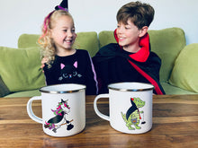 Load image into Gallery viewer, Perfect Halloween treat for the kids, personalised enamel mugs featuring either a vampire dinosaur or a unicorn witch